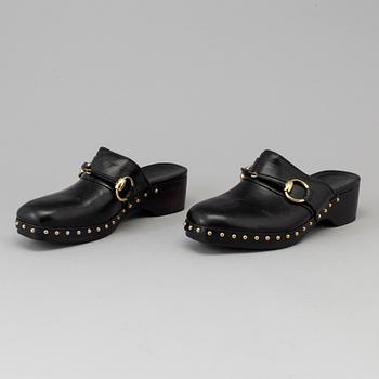 CLOGS by Gucci, size 40.