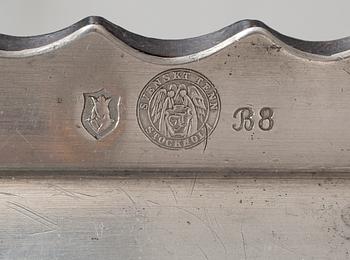 A Firma Svenskt Tenn pewter tray on a birch base, Stockholm 1928.