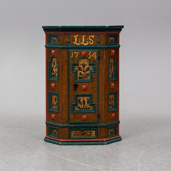 An 18th century painted cabinet.