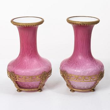 A pair of Louis XVI style vases, circa 1900.