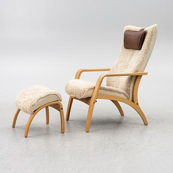 A 'Delta Adventure' armchair with footstool, Brunstad AS, Norway.