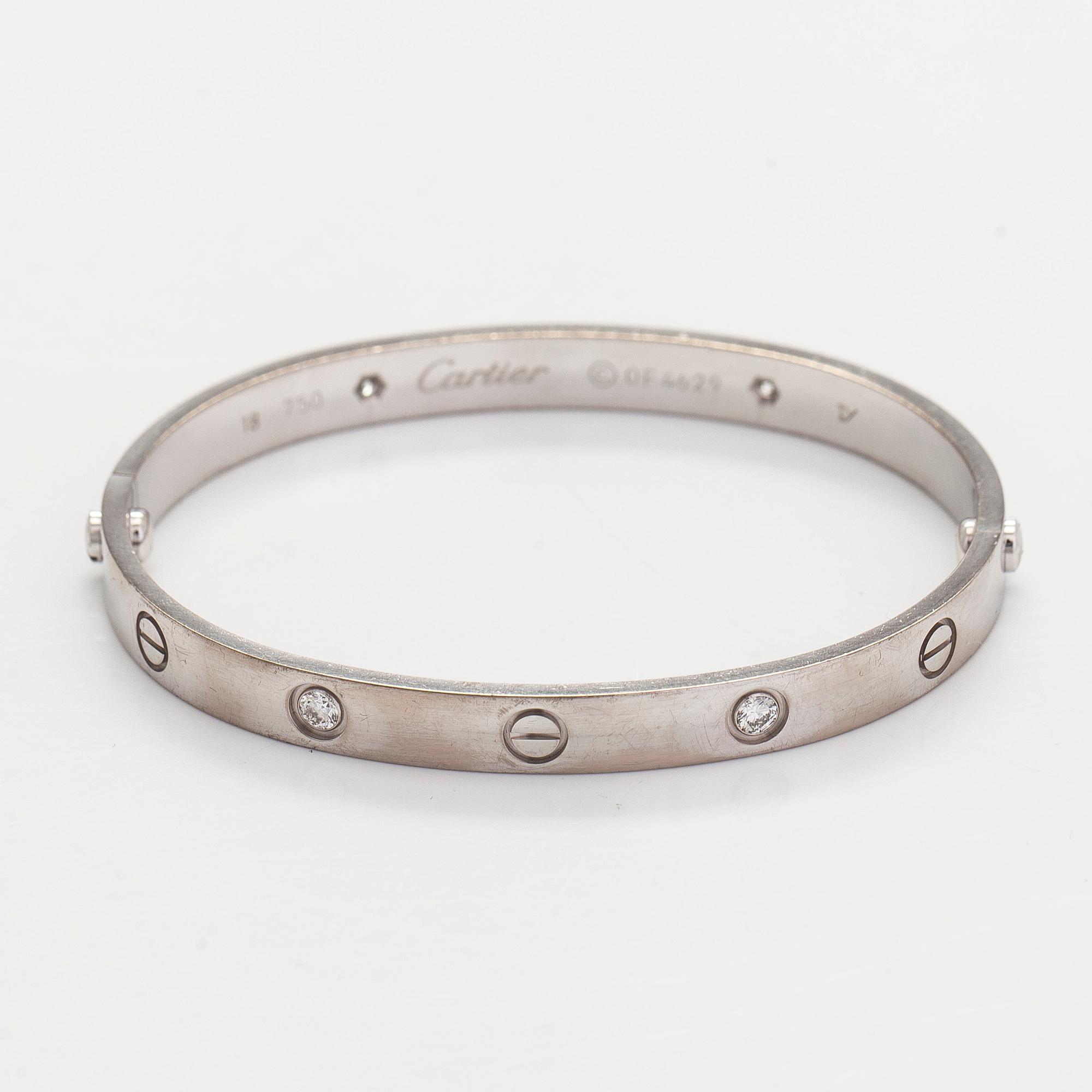 Cartier, rannekoru "Love", 18K valkokultaa, briljanttihiottuja timantteja.