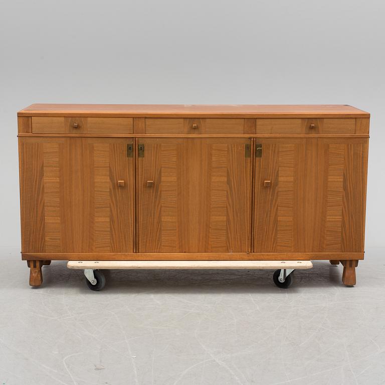 A Swedish second half of the 20th century Carl Malmsten "Ambassadör" sideboard veneered with walnut from Åfors möbler.