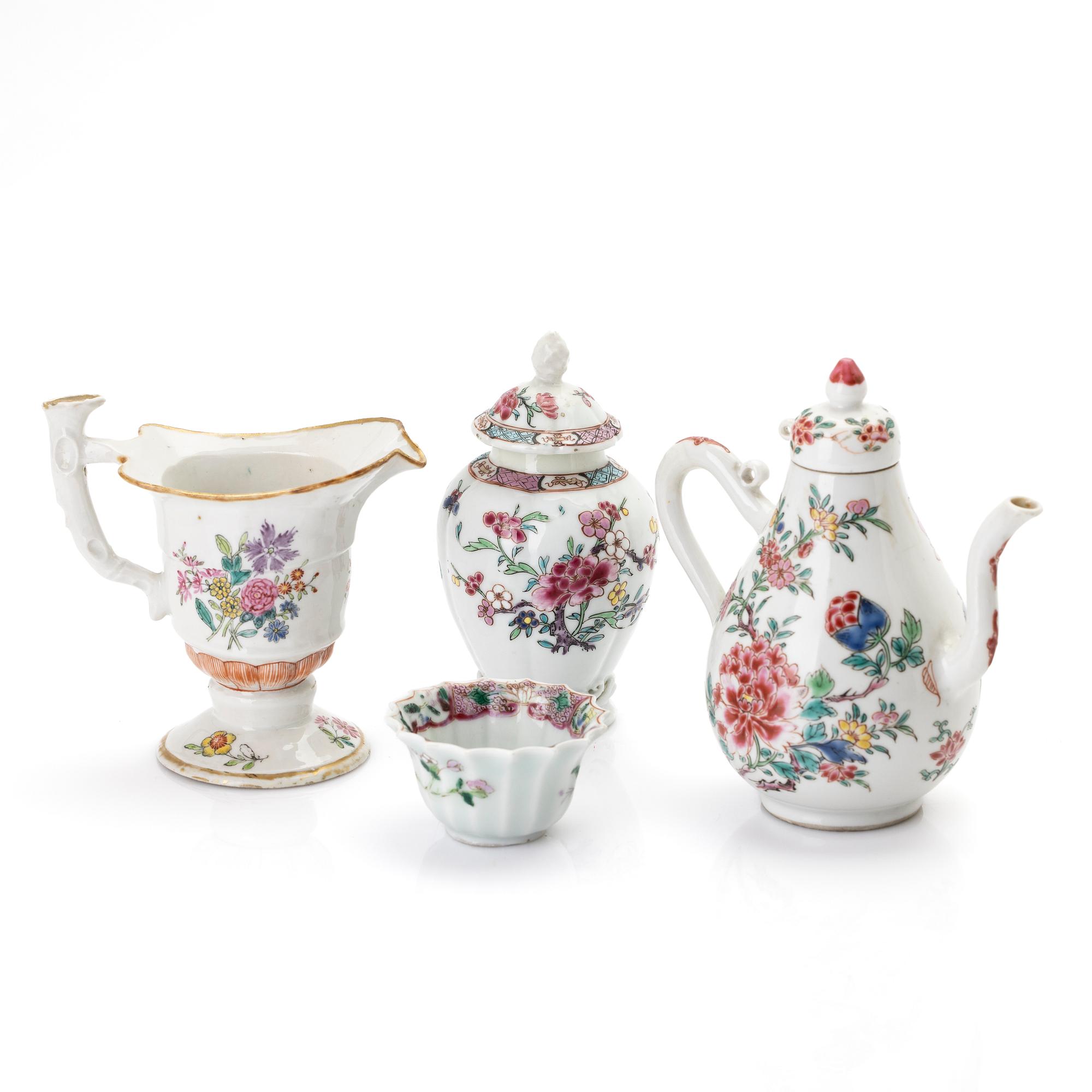 A group of two jugs, a cup and a jar with cover, famille rose porcelain, China, Qing dynasty, 18th century.