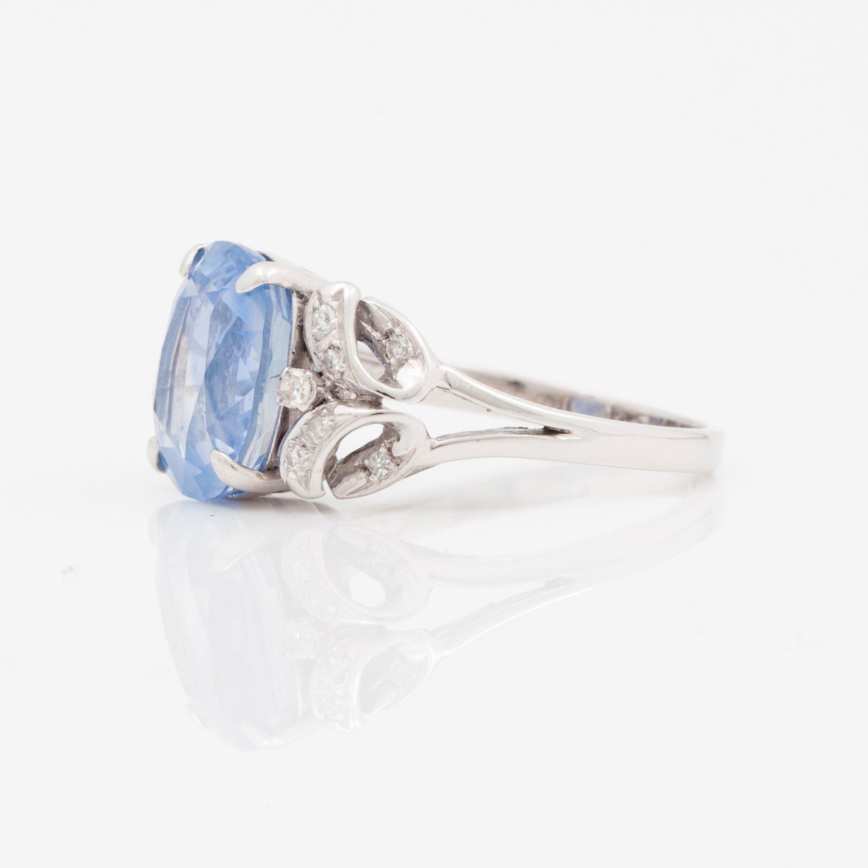 A circa 6.50 ct untreated sapphire (probably Ceylon) and single-cut diamond ring.