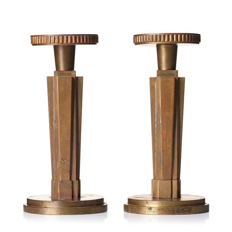 Lars Holmström, a pair of brass candlesticks, Arvika, Swedish Grace, 1920s/30s.