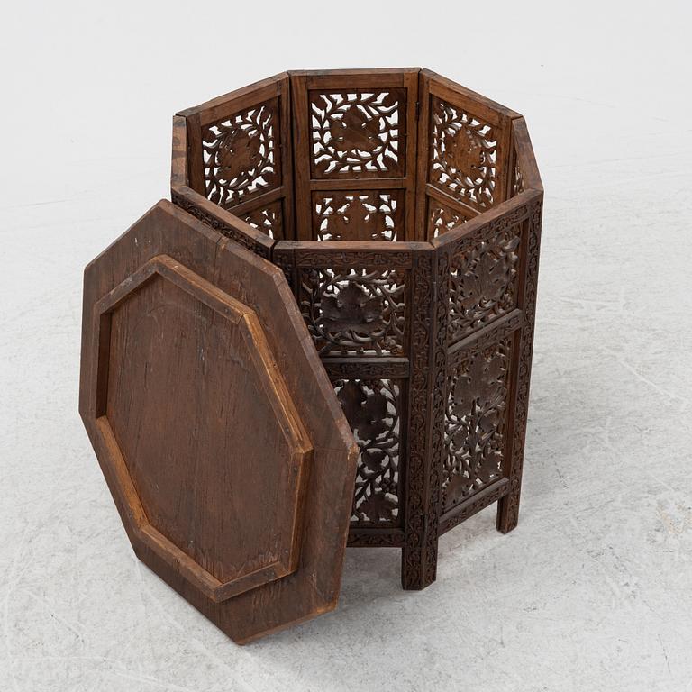 A carved table, first half of the 20th Century.