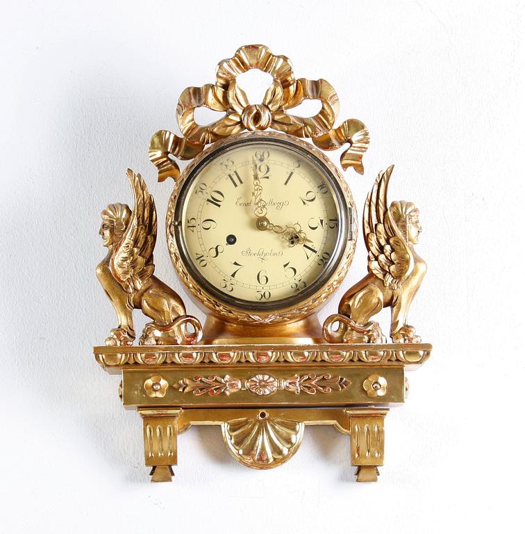 VÄGGPENDYL, empirestil, Ernst Lindberg, Stockholm.