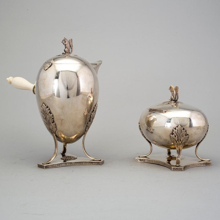 silver coffee pot with ivory handle and sugar bowl by CG Hallberg, Stockholm 1981 and 1920. Weight ca 1681 grams.