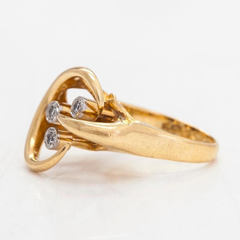 Björn Weckström, An 18K gold ring, with octagon-cut diamonds totalling ca 0.06 ct according to engraving. Lapponia 1974.