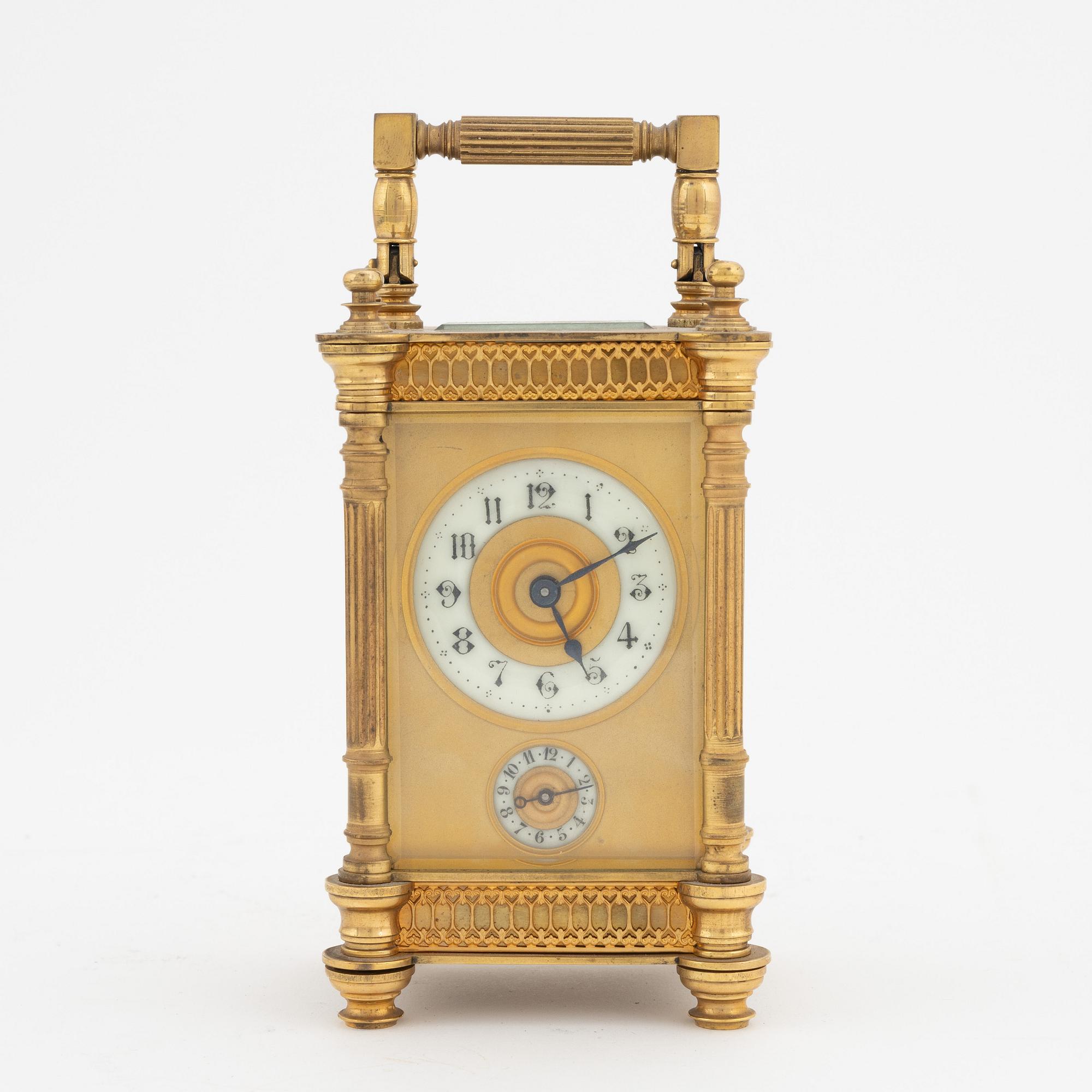 A brass carriage clock, Duverdrey & Bloquel, France, around the year 1900.
