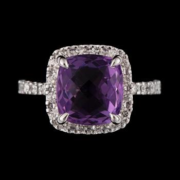 1107. A 4.50 ct amethyst and 0.55 ct diamond ring.
