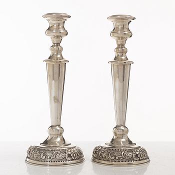 A pair of silver candelsticks, 20th Century.