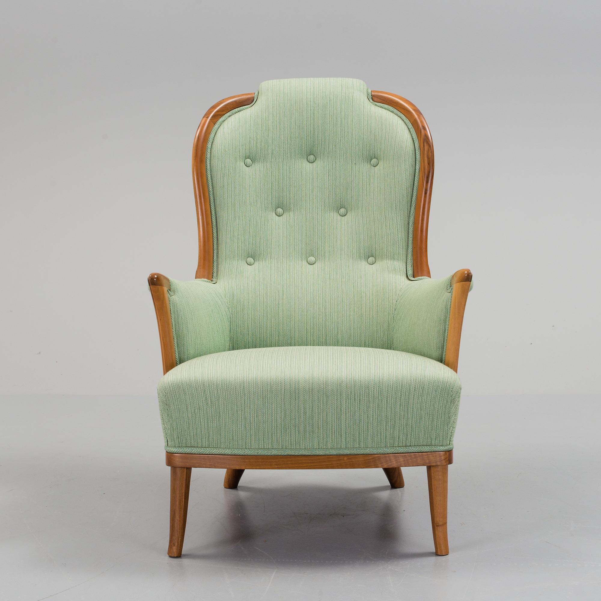 a Carl Malmsten "Vår Fru" armchair from the second half of the 20th century.