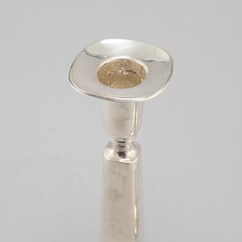 A pair of silver candlesticjs by Tore Eldh for K&EC in Gotheburg, 1970.