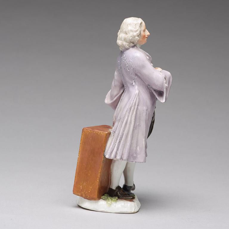 A Meissen porcelain figure of a trinket salesman from the series of Parisian street-traders, circa 1745.