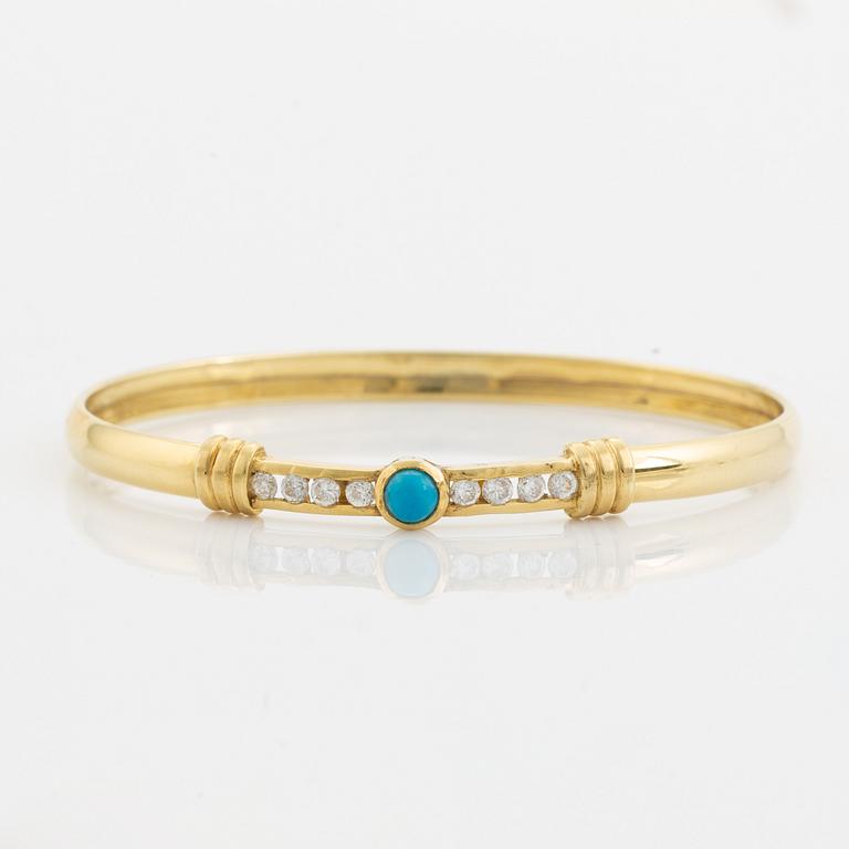 14K gold, turquoise and white stones.