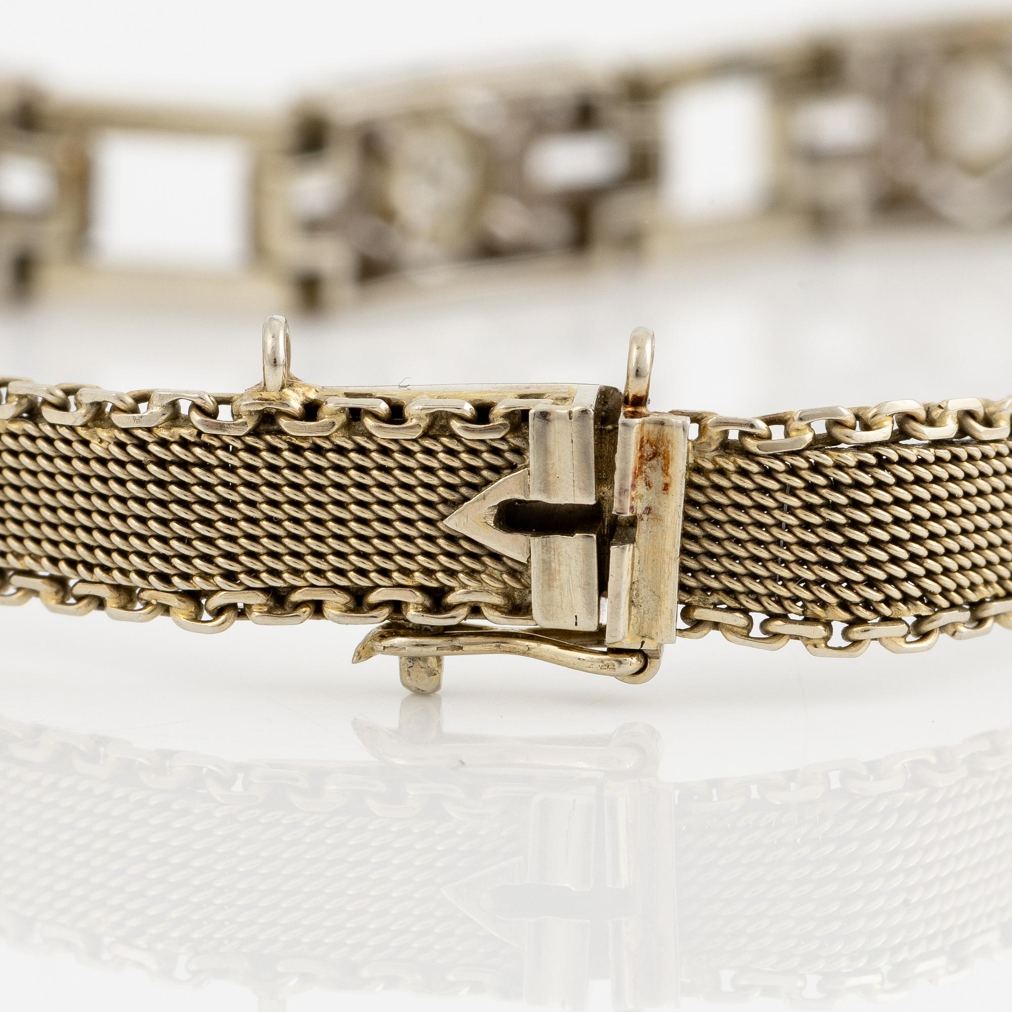 Arm bracelet, 18K white gold with brilliant-cut diamonds, old cut and octagonal-cut diamonds.