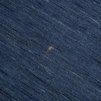 A loomed carpet, ca 400 x 300 cm.