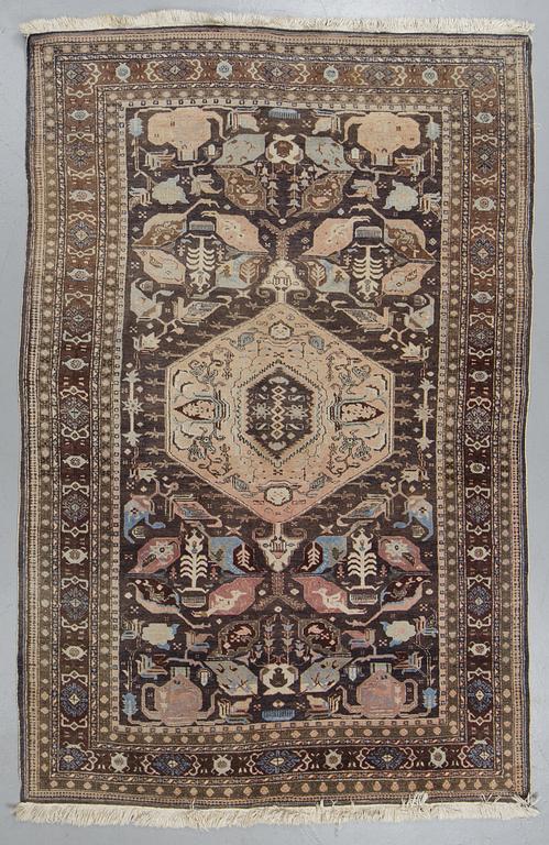 A carpet, semi-antique/Old Ardabil, ca 264 x 272 cm.