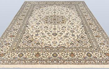A Keshan carpet, approx. 353 x 251 cm.
