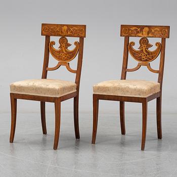 A pair of Royal Empire chairs, first half of the 19th Century.