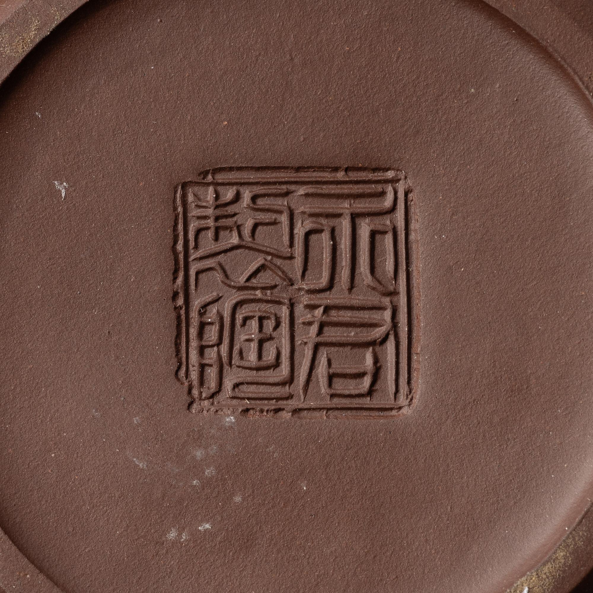 A group of three Chinese yixing teapots, 1960-80s.