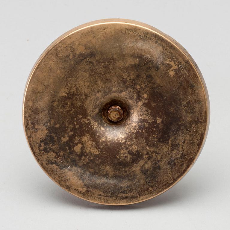 A BRASS CANDLE STICK.