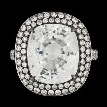 213. A large faceted white zircon, 16.09 cts,and brilliant cut diamond ring, tot. 1.64 ct.