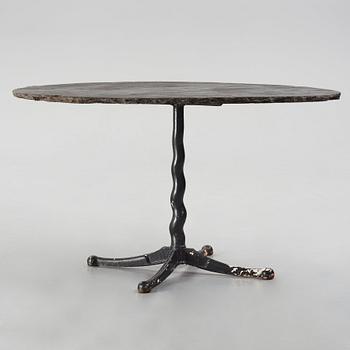 Josef Frank, attributed to, a cast iron base table for Firma Svenskt Tenn, Sweden 1930s-40s.