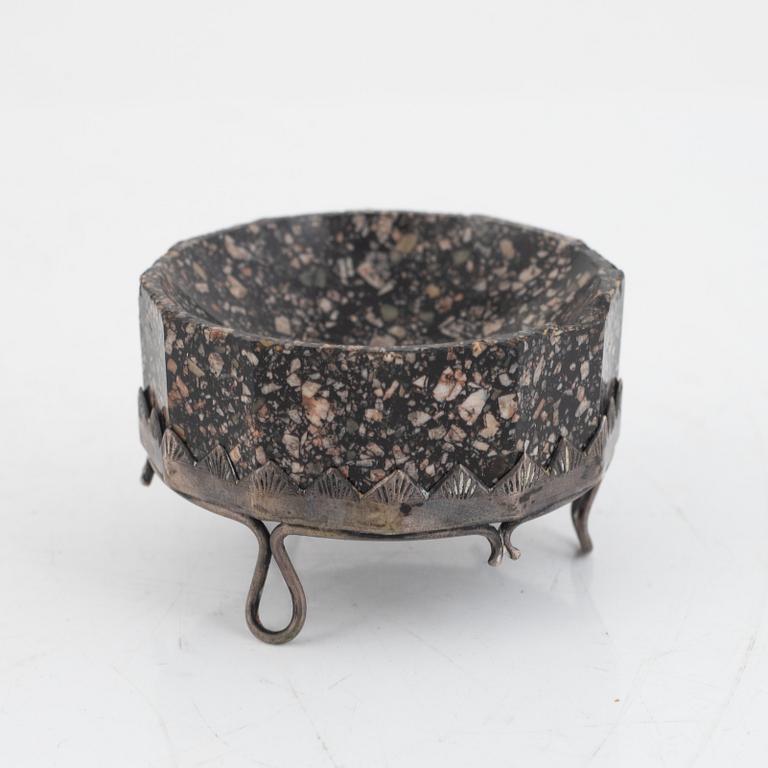 An early 19th century 'Orrlok' porphyry salt with a silver stand,  mark of C. L. Nordström, Uddevalla 1897.