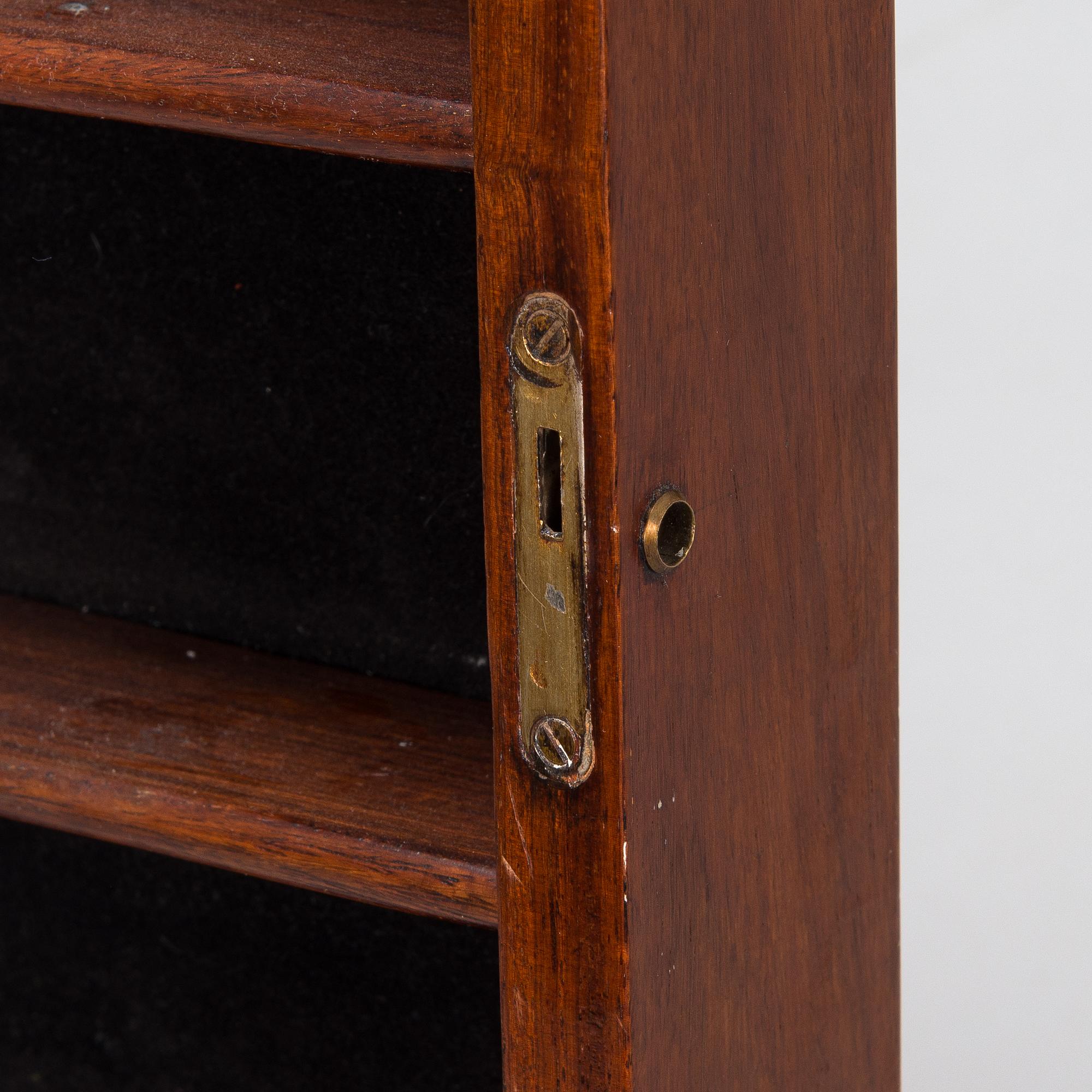 A Chinese 20th century hardwood wall cabinet.