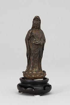 A Chinese 18th century bronze figure of Guanyin.