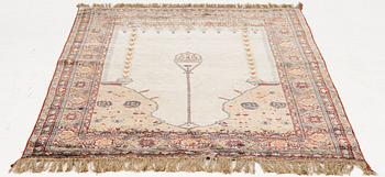 A semi-antique silk rug, probably Tabriz, c 164 x 110 cm,.