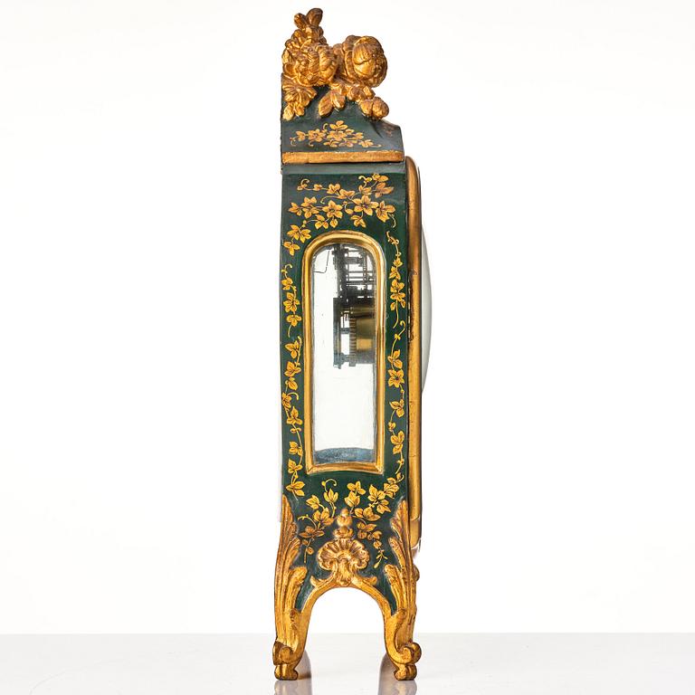 A Swedish rococo mantel clock by N Berg.