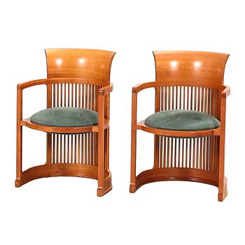 Frank Lloyd Wright, a pair of Barrel chairs model no 606 for Cassina numbered and dated 1986.