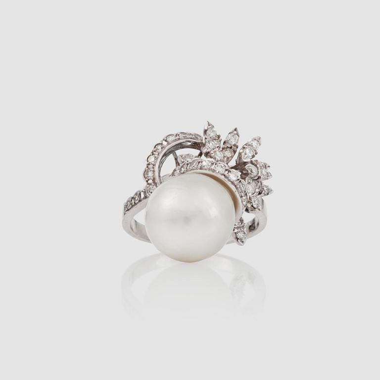 A cultured South Sea pearl and brilliant-cut diamond ring.