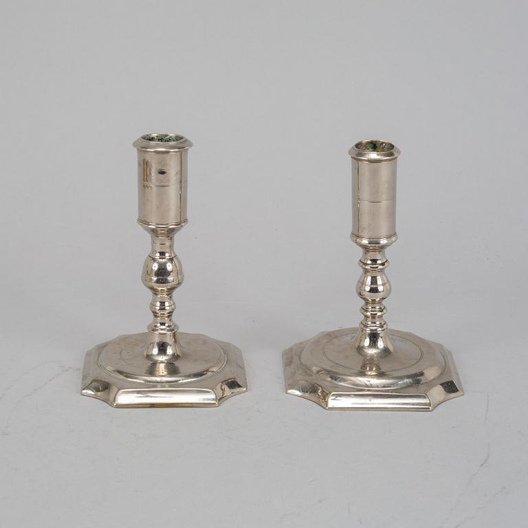Two Swedish 18th century candlesticks.