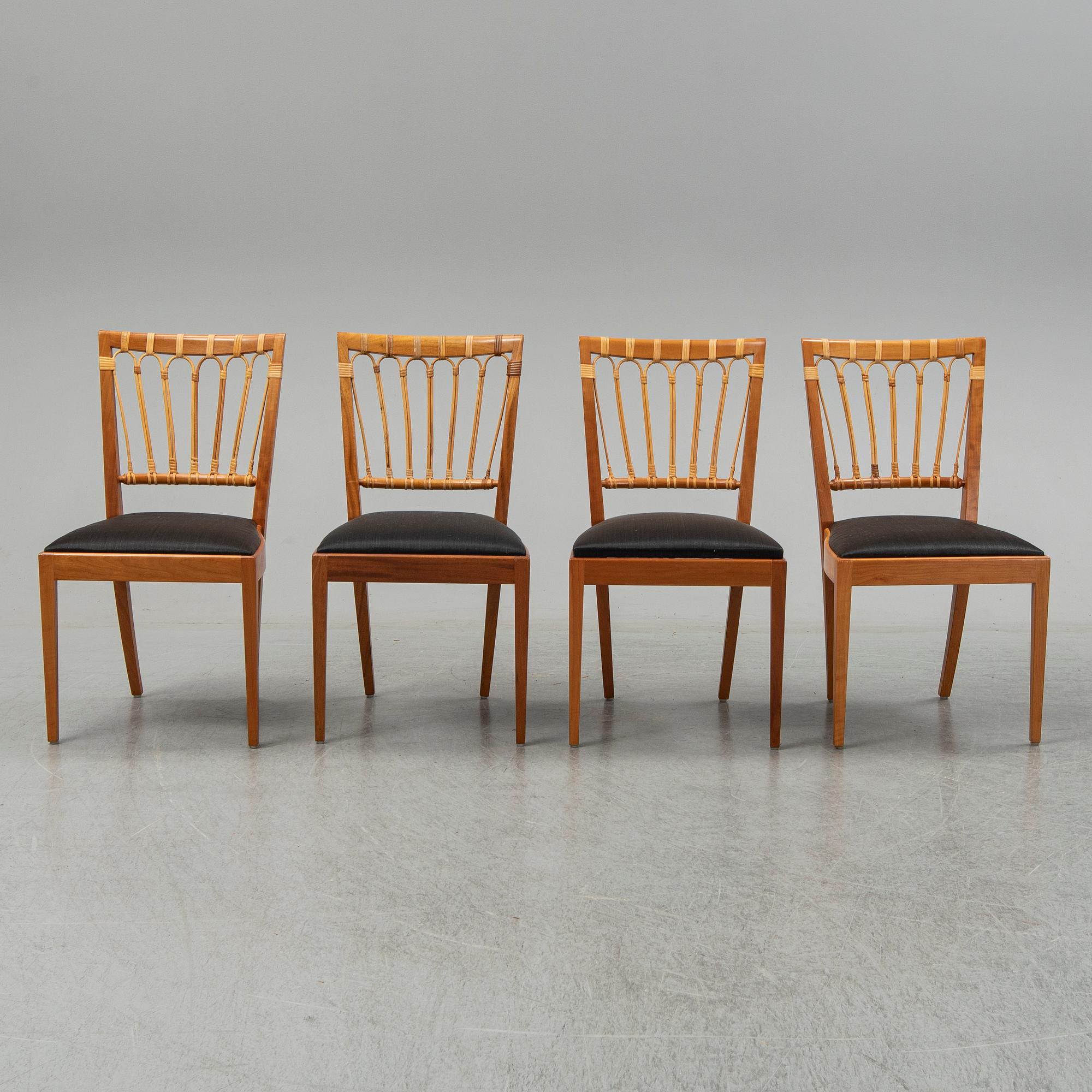 A set of four mahogany and rattan dining chairs, Josef Frank, , model 1165, Svenskt Tenn, Stockholm.