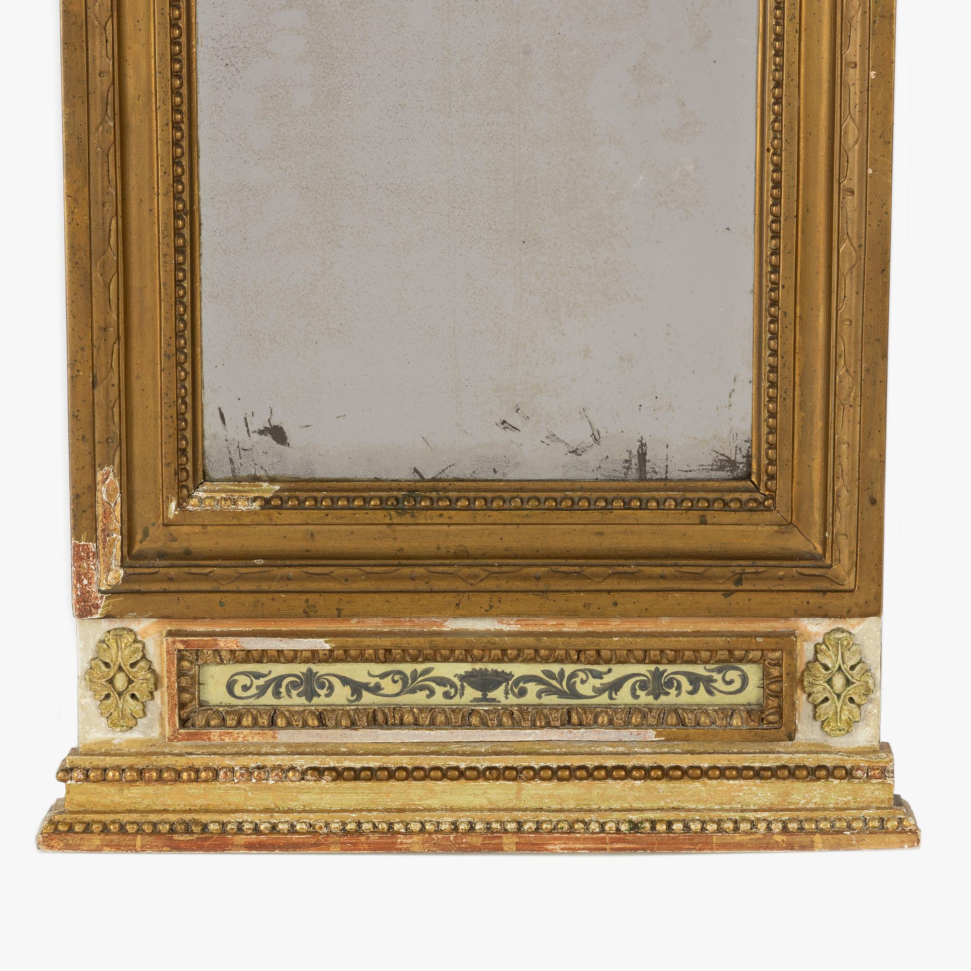 A late Gustavian giltwood mirror attributed to O. Wetterberg (master 1785-1803).