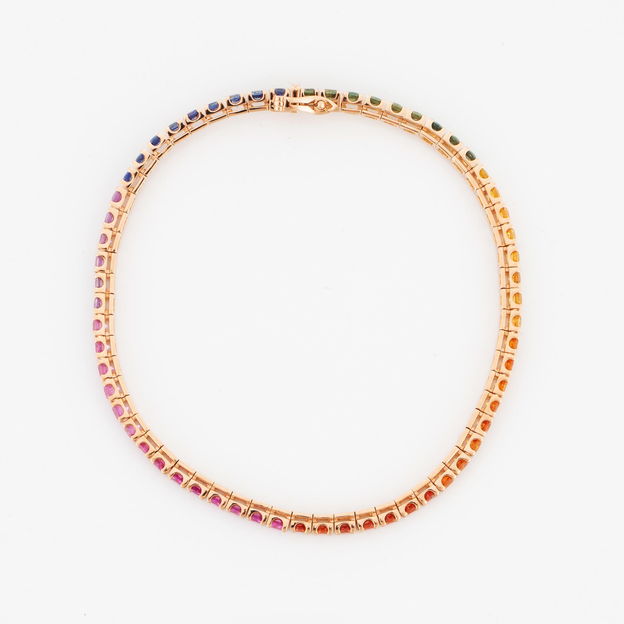 TENNISARMBAND, med multifärgade runda fasettslipade safirer.