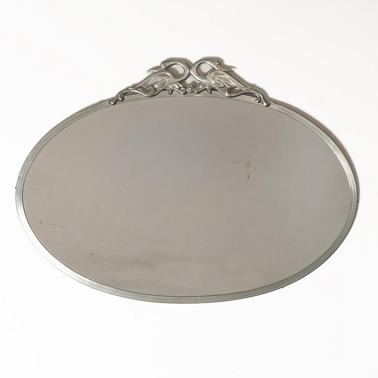 Mirror and mirror sconces, a pair, tin, Sweden, 1920s-30s.