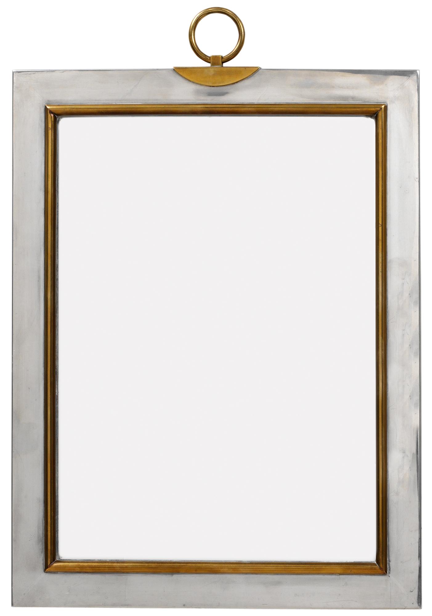 A Firma Svenskt Tenn pewter and brass wall mirror, Stockholm 1959.