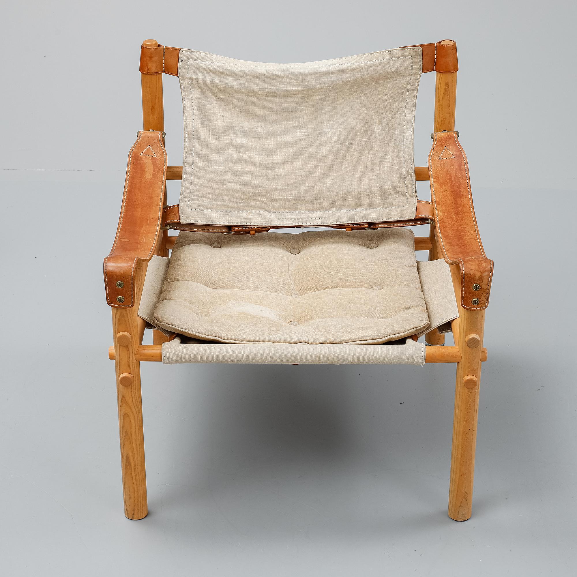 Arne Norell, a set of three "Sirocco" armchairs and two tables, Norell.
