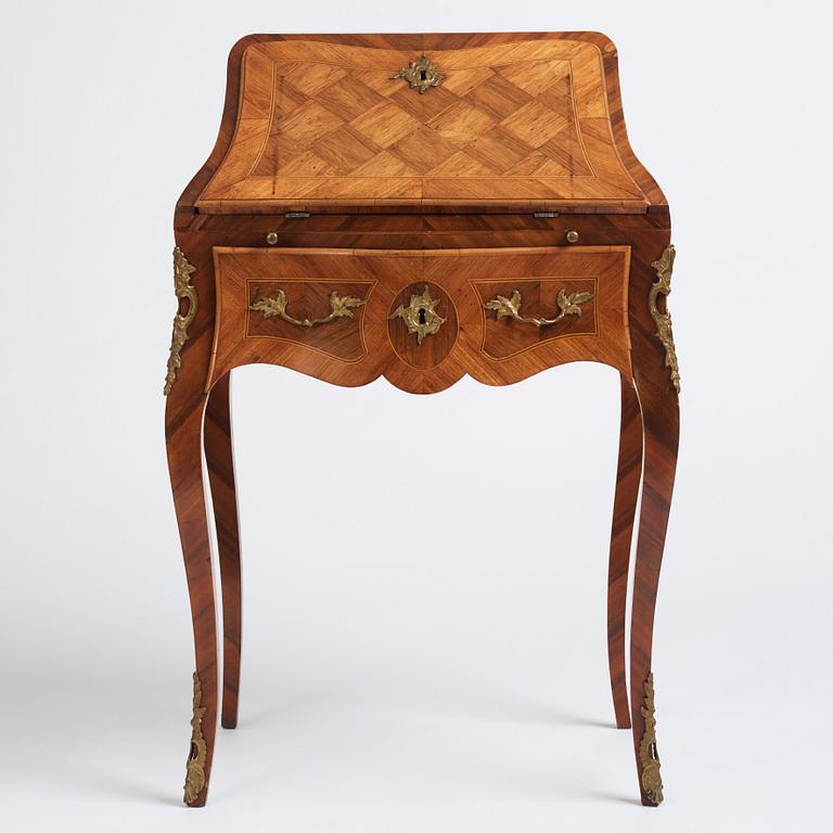 A rococo parquetry secretaire, Stockholm, later part of the 18th century.