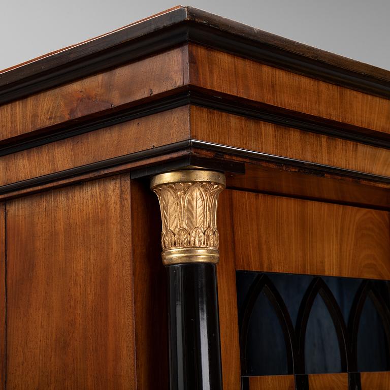 An Empire mahogany cabinet, first half of the 19th Century.