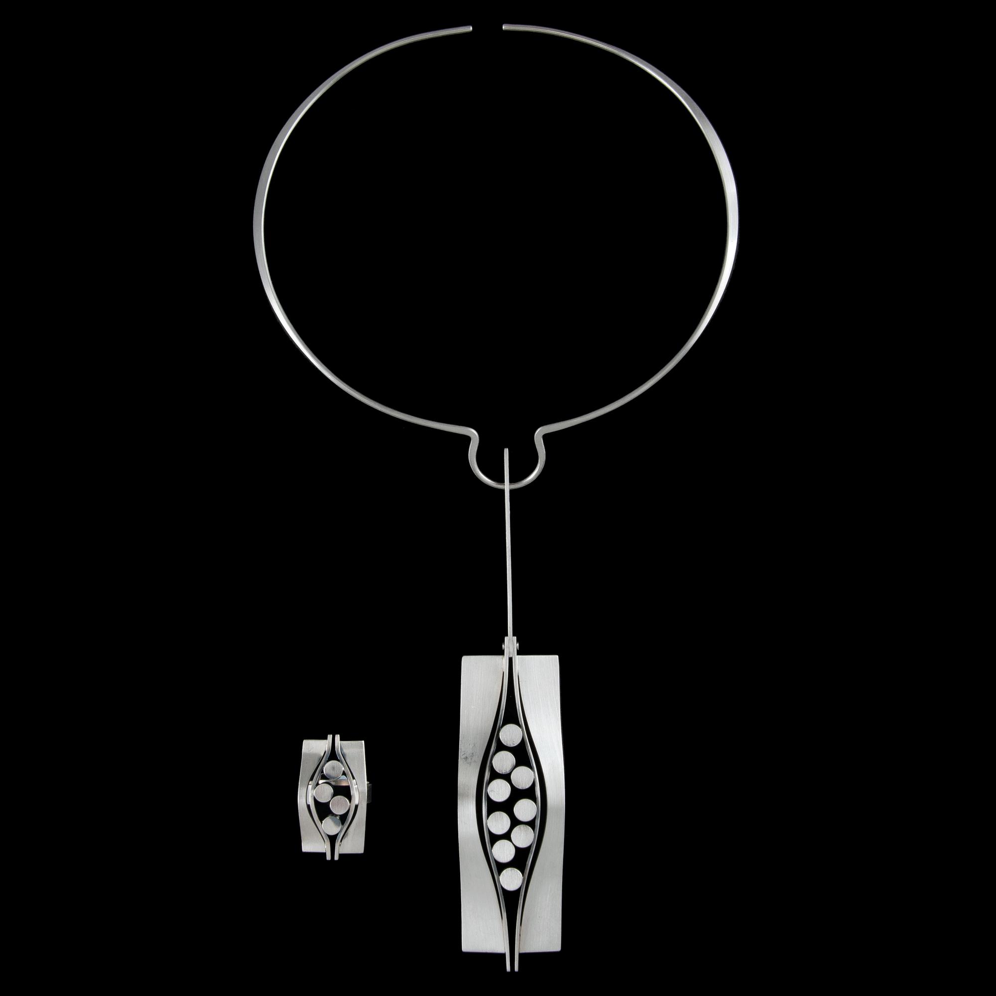 Elis Kauppi, A PENDANT AND A RING, silver, Kupittaan Kulta 1974. Weight tot. 69 g.