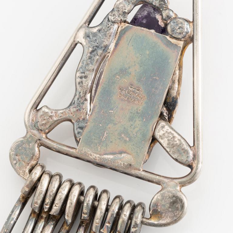 Pendant, pewter, Dansk Smyckekonst and bracelet, sterling silver, Owe Johansson.