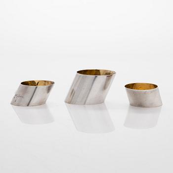 Napkin rings, 9 pcs, silver, Finland and Germany 1898-1968, and corn forks, 3 pcs, sterling silver, Mexico.