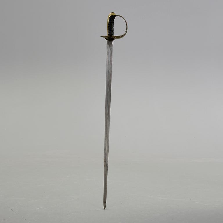 SABEL, för manskap vid kavalleriet, m/1893, samt TRÄNINGSSABEL, omkring år 1900.